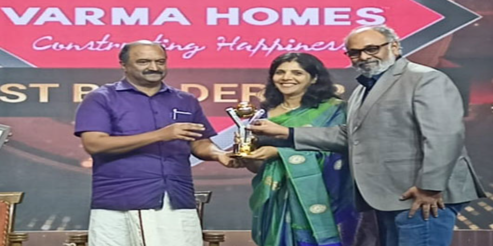 Receiving the Best Builder Brand Award 2022 from News 18 Kerala